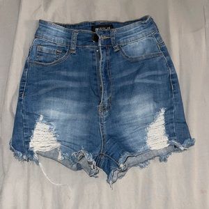 FASHION NOVA ripped jean shorts